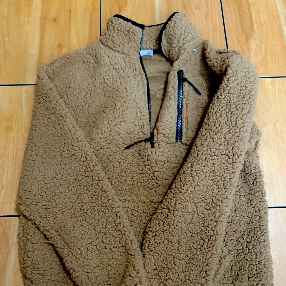 very fuzzy brown zip up jacket
